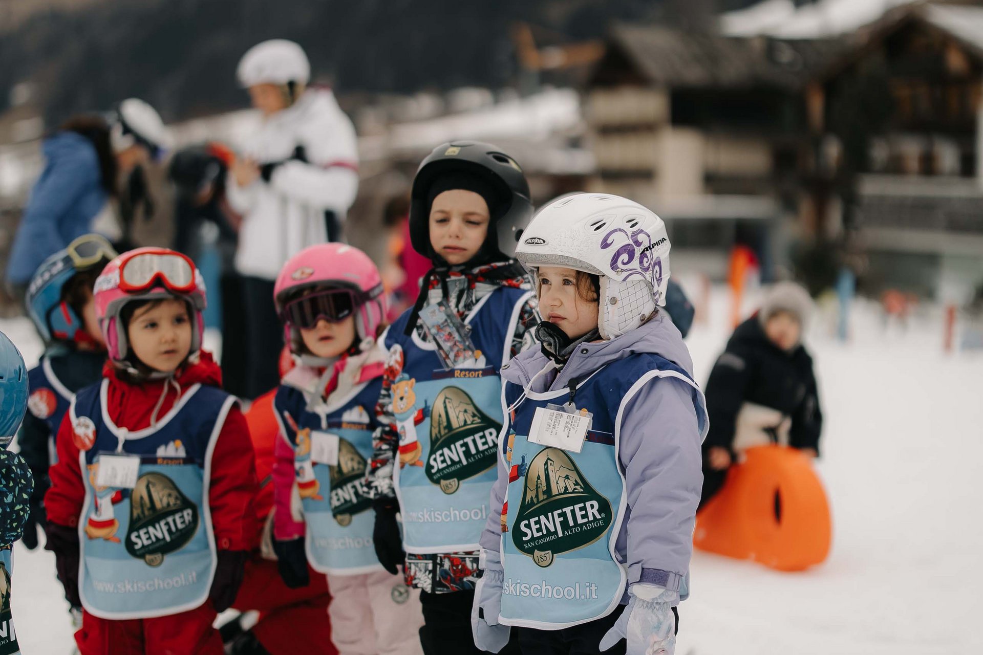 The in-house Rainer Ski School Children learning to ski at a ski school in the snow